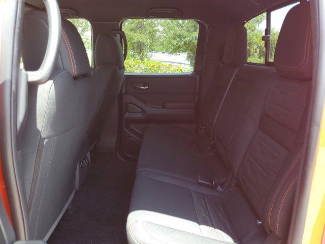 Photo of 2025 Afterburn Orange Nissan Frontier