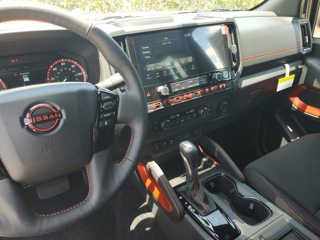 Photo of 2025 Afterburn Orange Nissan Frontier
