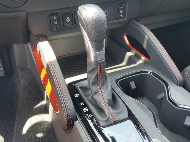 Photo of 2025 Afterburn Orange Nissan Frontier