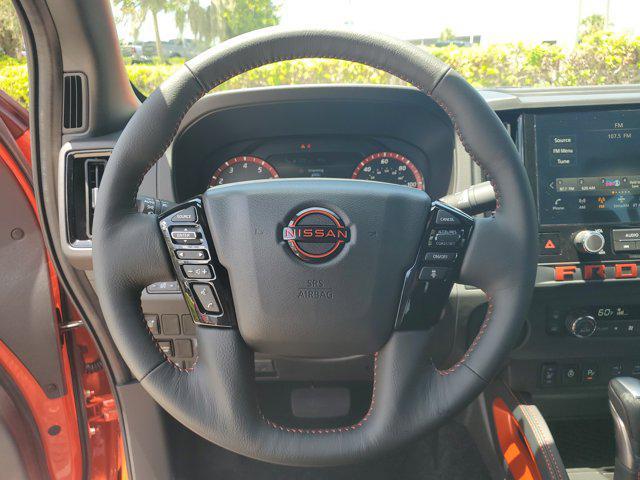 Photo of 2025 Afterburn Orange Nissan Frontier