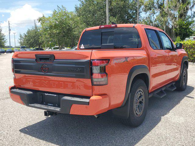 Photo of 2025 Afterburn Orange Nissan Frontier