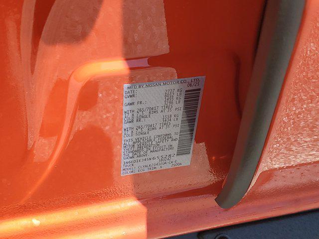 Photo of 2025 Afterburn Orange Nissan Frontier