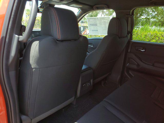 Photo of 2025 Afterburn Orange Nissan Frontier