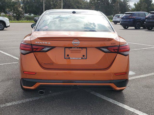Photo of 2025 Monarch Orange Metallic/Super Black Nissan Sentra