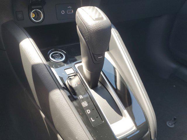 Photo of 2025 Scarlet Ember Tintcoat Nissan Versa