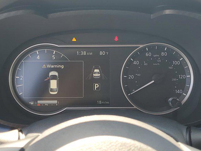 Photo of 2025 Scarlet Ember Tintcoat Nissan Versa