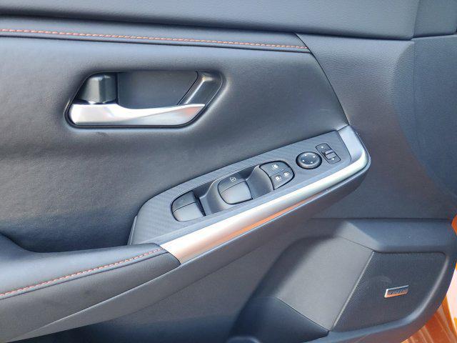 Photo of 2025 Monarch Orange Metallic/Super Black Nissan Sentra