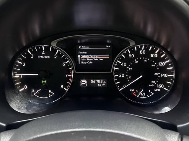 Photo of 2014 Pearl White Nissan Altima