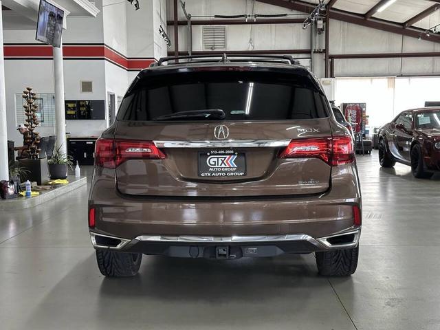Photo of 2019 Canyon Bronze Metallic Acura MDX