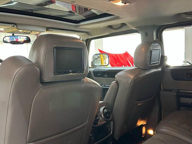 Photo of 2003 Yellow Hummer H2