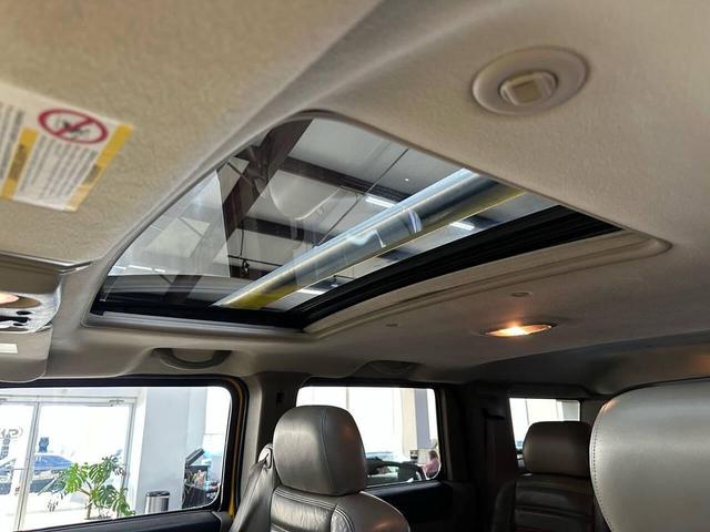 Photo of 2003 Yellow Hummer H2