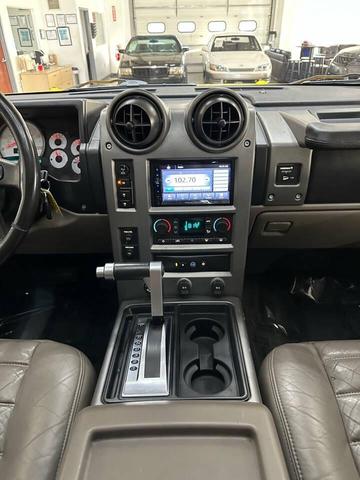 Photo of 2003 Yellow Hummer H2