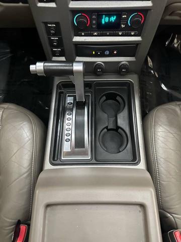 Photo of 2003 Yellow Hummer H2