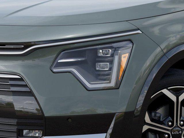 Photo of 2025 Cityscape Green Kia Niro