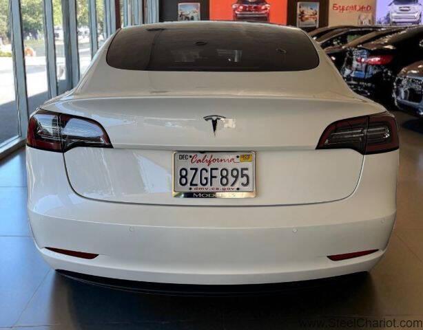 Photo of 2022 Pearl White Multi-Coat Tesla Model 3