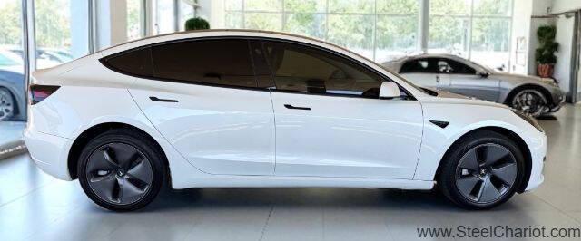 Photo of 2022 Pearl White Multi-Coat Tesla Model 3