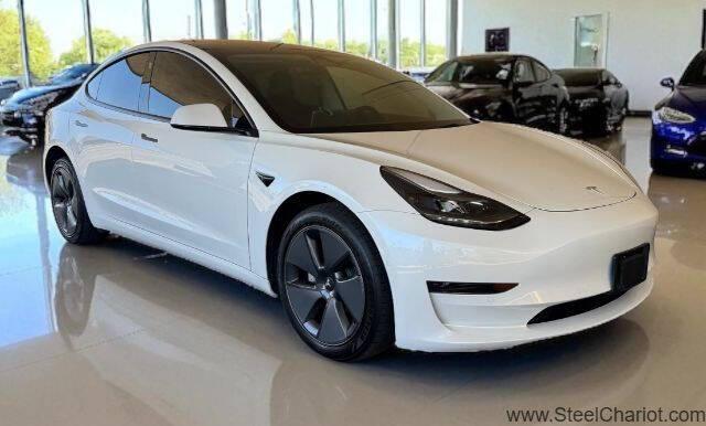 Photo of 2022 Pearl White Multi-Coat Tesla Model 3