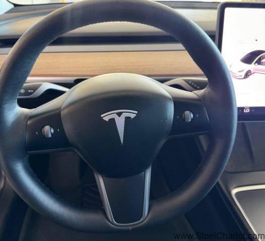 Photo of 2022 Pearl White Multi-Coat Tesla Model 3