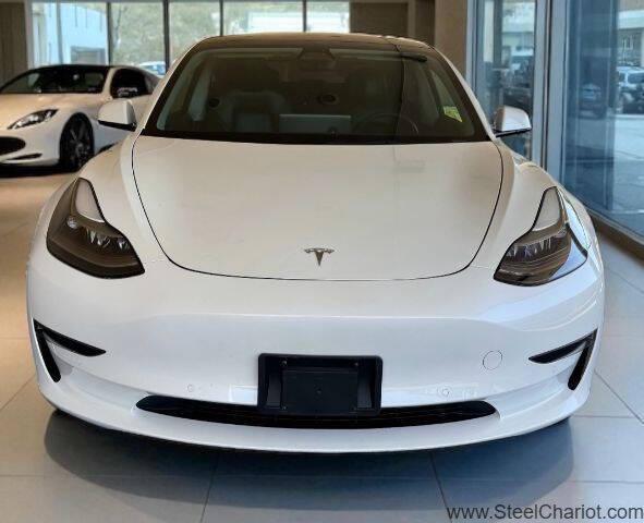 Photo of 2022 Pearl White Multi-Coat Tesla Model 3