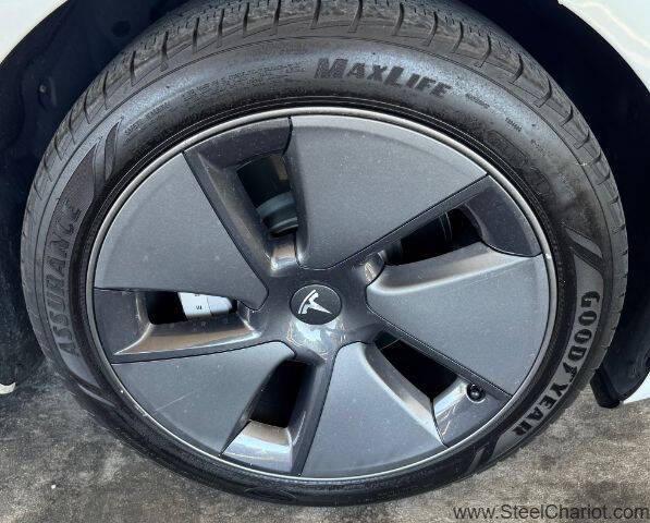 Photo of 2022 Pearl White Multi-Coat Tesla Model 3