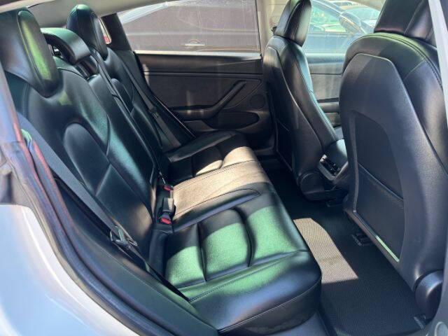 Photo of 2022 Pearl White Multi-Coat Tesla Model 3