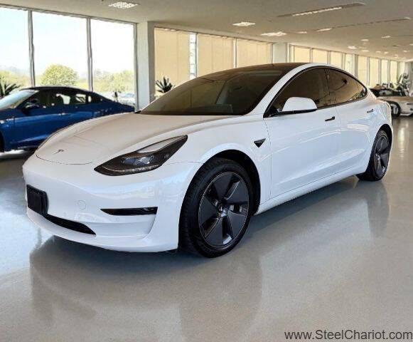 Photo of 2022 Pearl White Multi-Coat Tesla Model 3