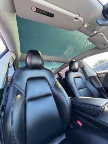 Photo of 2022 Pearl White Multi-Coat Tesla Model 3