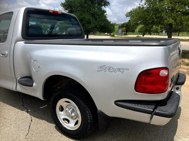 Photo of 2002 Silver Clearcoat Metallic Ford F-150