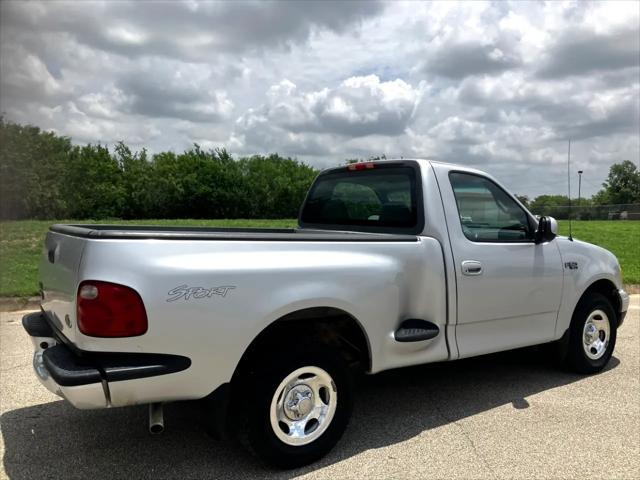 Photo of 2002 Silver Clearcoat Metallic Ford F-150