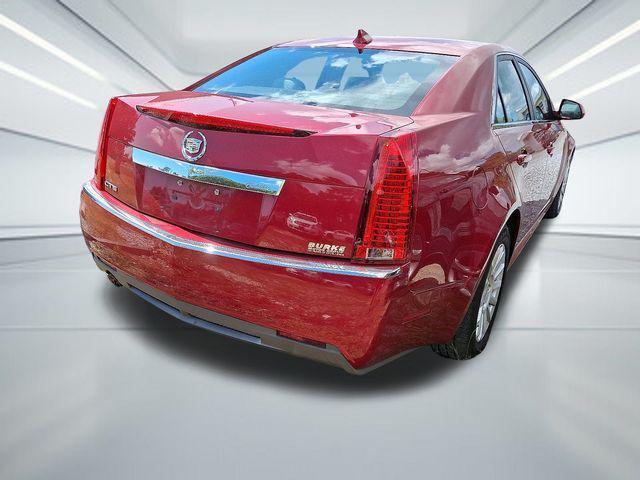 Photo of 2011 Crystal Red Tintcoat Cadillac CTS