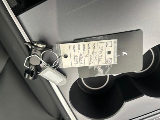 Photo of 2025 White Tesla Model Y