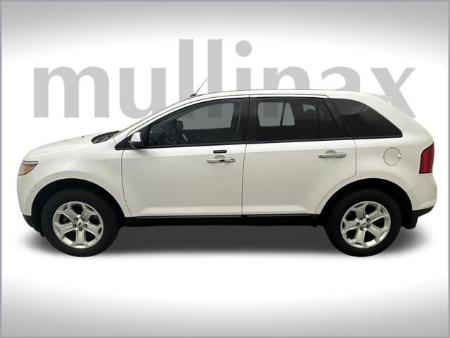 Photo of 2011 White Platinum Clearcoat Metallic Ford Edge