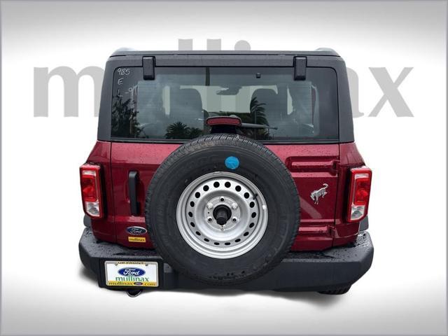 Photo of 2025 Ruby Red Metallic Tinted Clearcoat Ford Bronco
