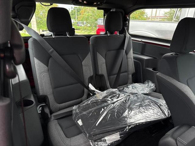 Photo of 2025 Ruby Red Metallic Tinted Clearcoat Ford Bronco