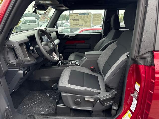 Photo of 2025 Ruby Red Metallic Tinted Clearcoat Ford Bronco