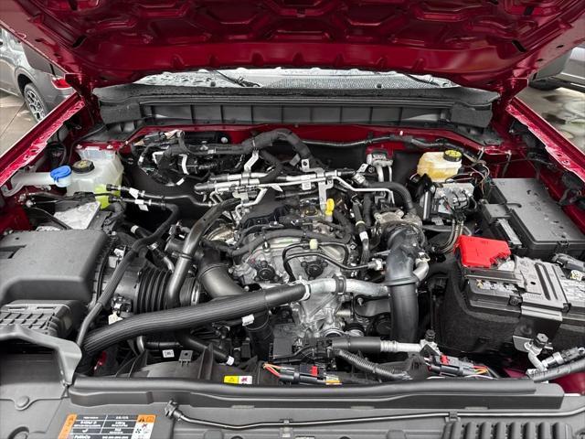 Photo of 2025 Ruby Red Metallic Tinted Clearcoat Ford Bronco