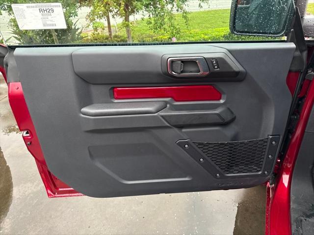 Photo of 2025 Ruby Red Metallic Tinted Clearcoat Ford Bronco