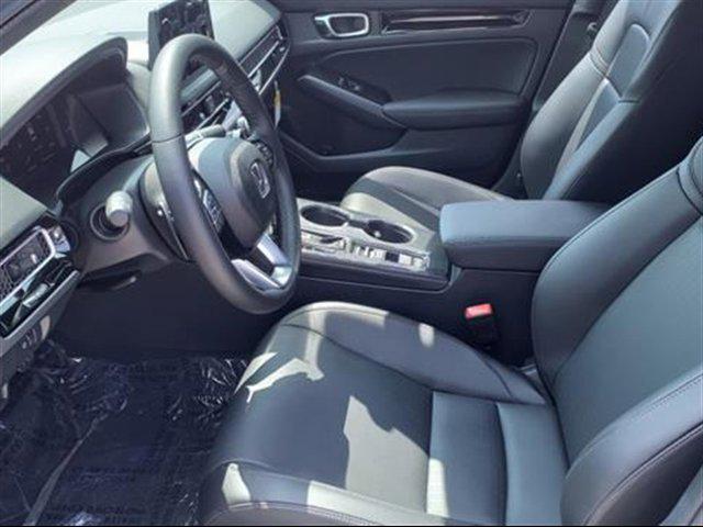 Photo of 2025 Crystal Black Pearl Honda Civic Hybrid