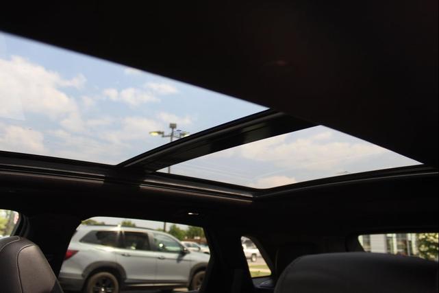 Photo of 2022 Stellar Black Metallic Cadillac XT5