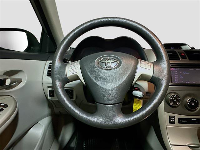 Photo of 2013 Classic Silver Metallic Toyota Corolla