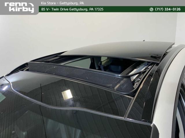 Photo of 2025 Snow White Pearl Kia Sportage Hybrid