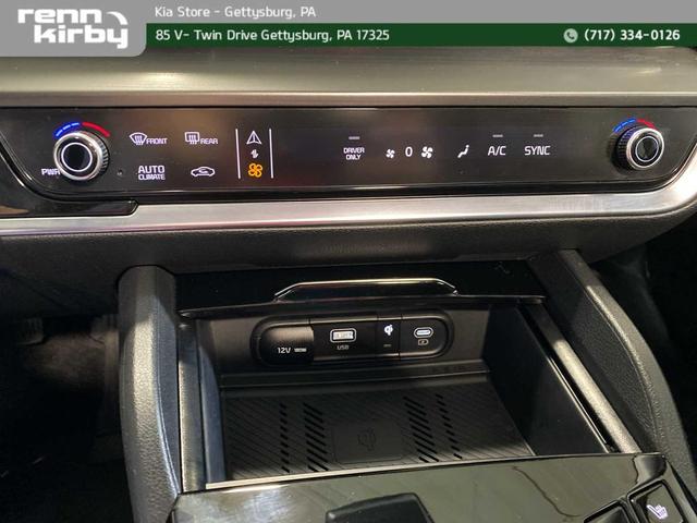 Photo of 2025 Snow White Pearl Kia Sportage Hybrid