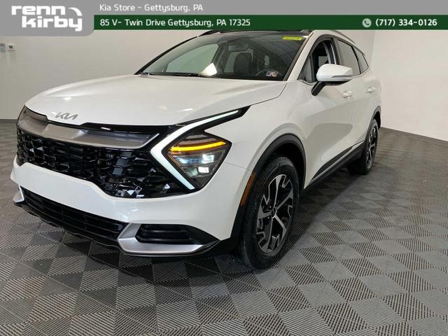Photo of 2025 Snow White Pearl Kia Sportage Hybrid
