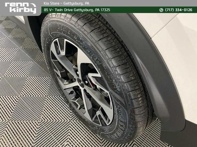 Photo of 2025 Snow White Pearl Kia Sportage Hybrid