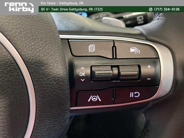 Photo of 2025 Snow White Pearl Kia Sportage Hybrid