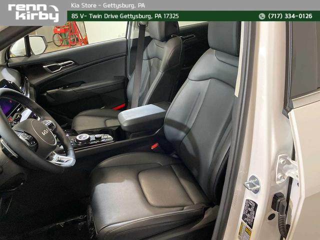 Photo of 2025 Snow White Pearl Kia Sportage Hybrid