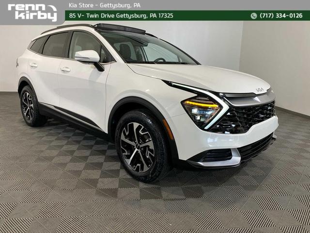 Photo of 2025 Snow White Pearl Kia Sportage Hybrid
