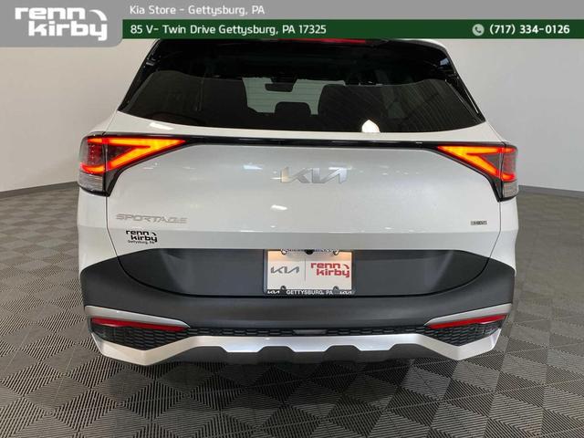 Photo of 2025 Snow White Pearl Kia Sportage Hybrid