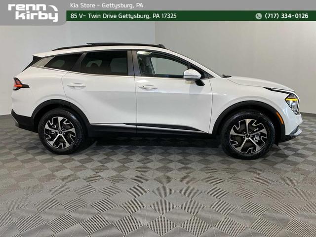 Photo of 2025 Snow White Pearl Kia Sportage Hybrid