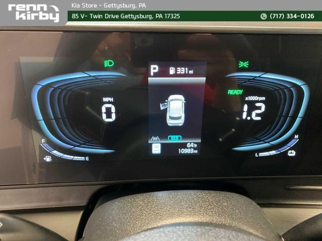 Photo of 2025 Snow White Pearl Kia Sportage Hybrid